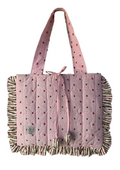 A pink quilted tote bag with a small repeating pattern, ruffled edges, and long shoulder straps, shown against a plain white background.