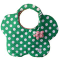 A green quilted tote bag with white polka dots.