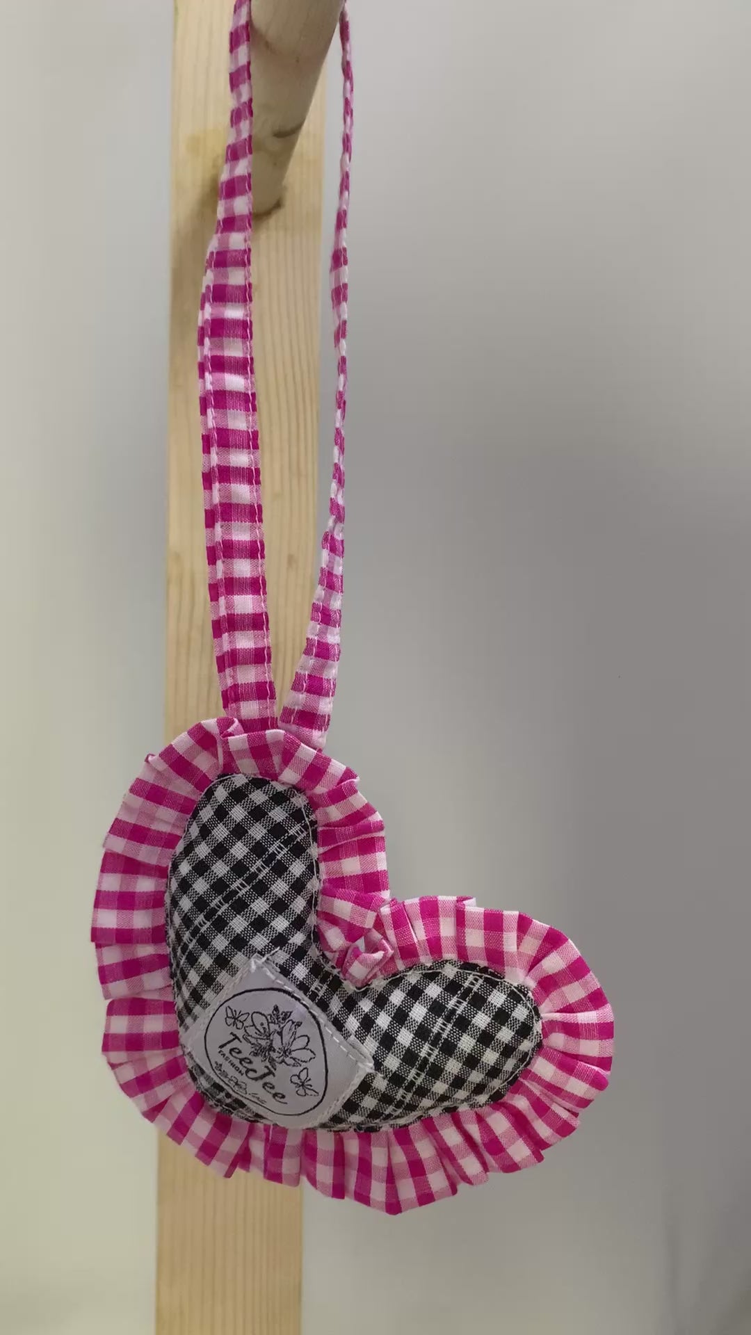 video with gingham heart charm