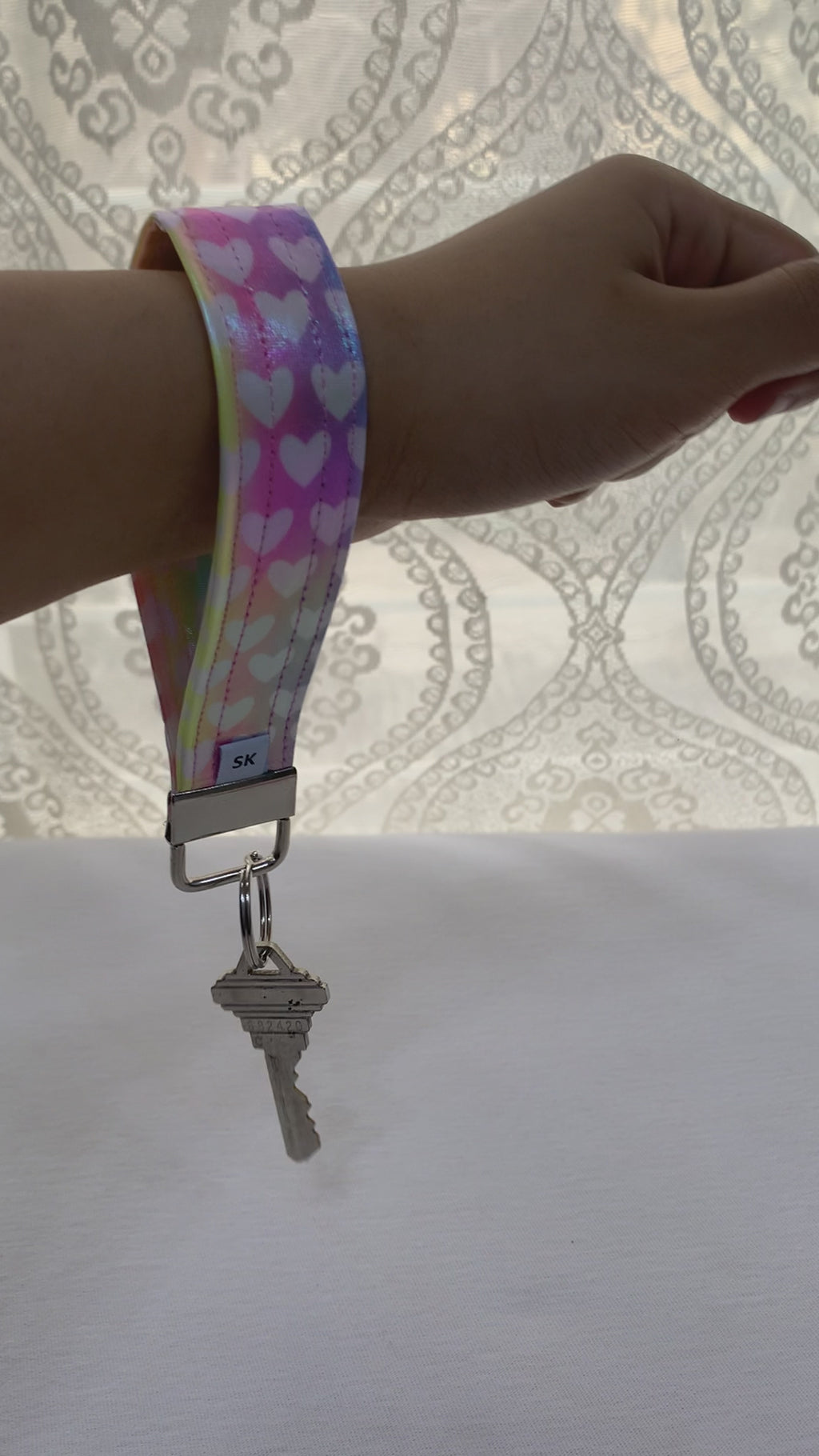 A video displaying keychain with key for reference.  