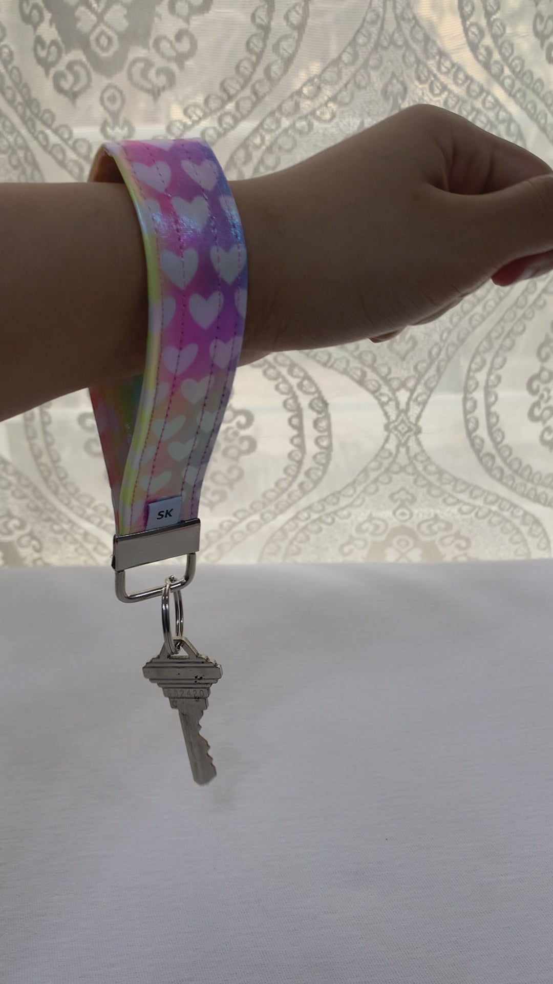 A video displaying keychain with key for reference.  