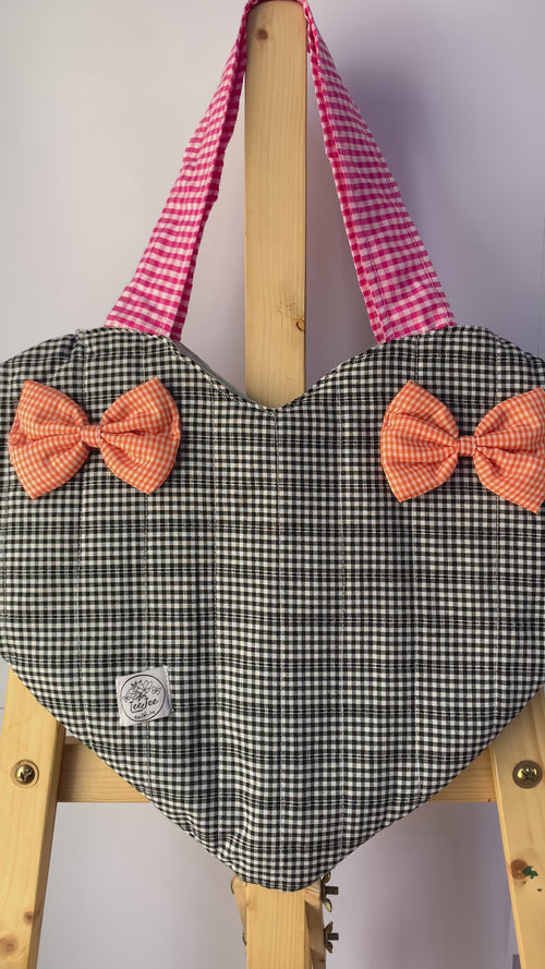 Video showing heart tote bag